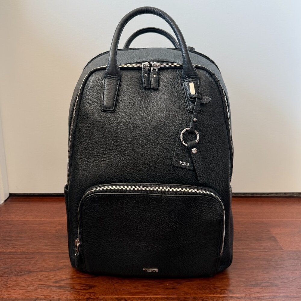 TUMI Indra Backpack in black pebbled leather w/ silver hardware, great condition
